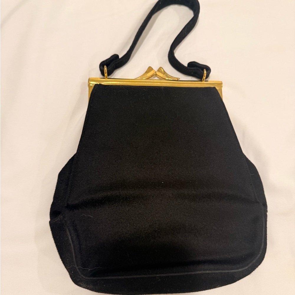 Elegant Vintage Black Handbag with Gold Accents